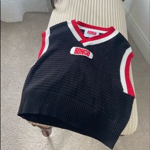 This is a trendy sweater vest that works for all seasons